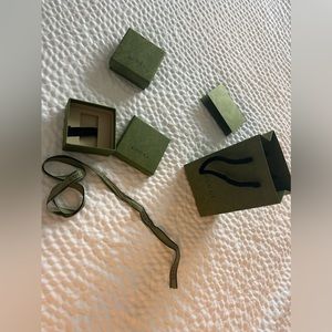 Genuine Gucci gift ribbon, two jewelry boxes, gift bag and receipt envelope